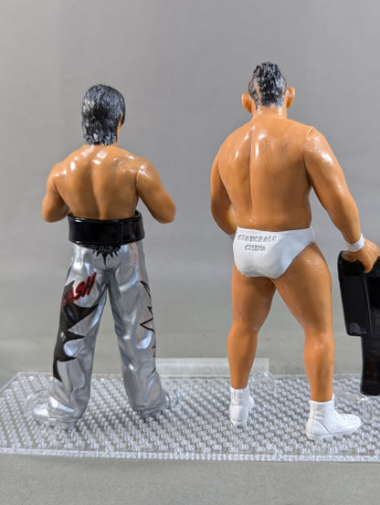 Minoru Suzuki (white) & Naomichi Marufuji  (silver)