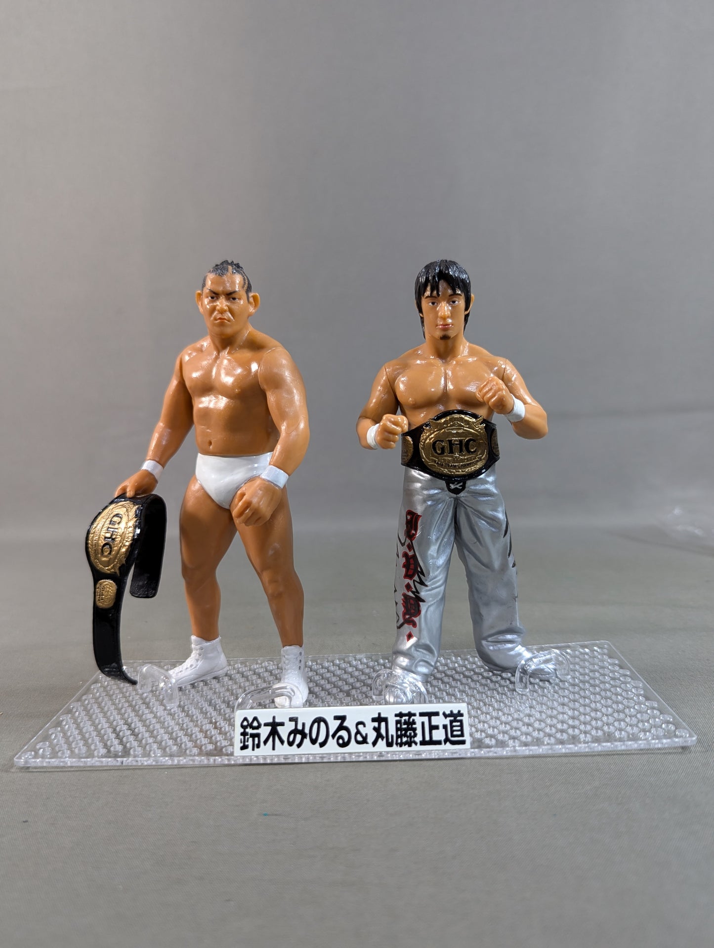 Minoru Suzuki (white) & Naomichi Marufuji  (silver)