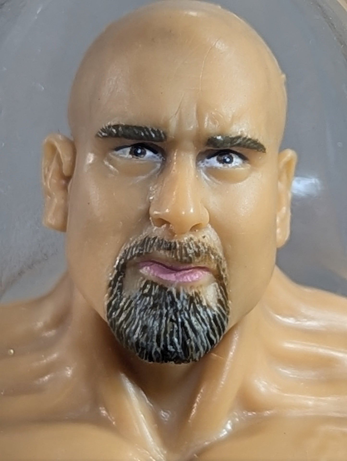 Goldberg (chair, black pants)