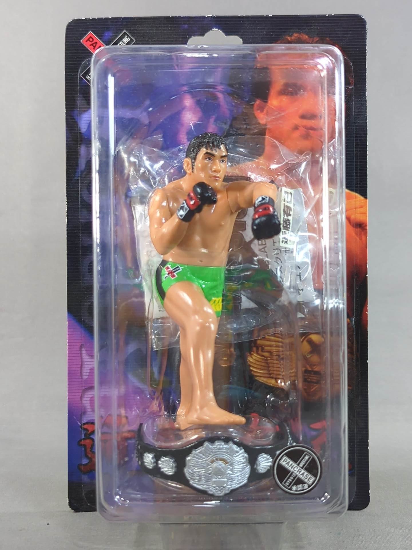 Yuki Kondo (with belt, yellow-green pants, left hook)