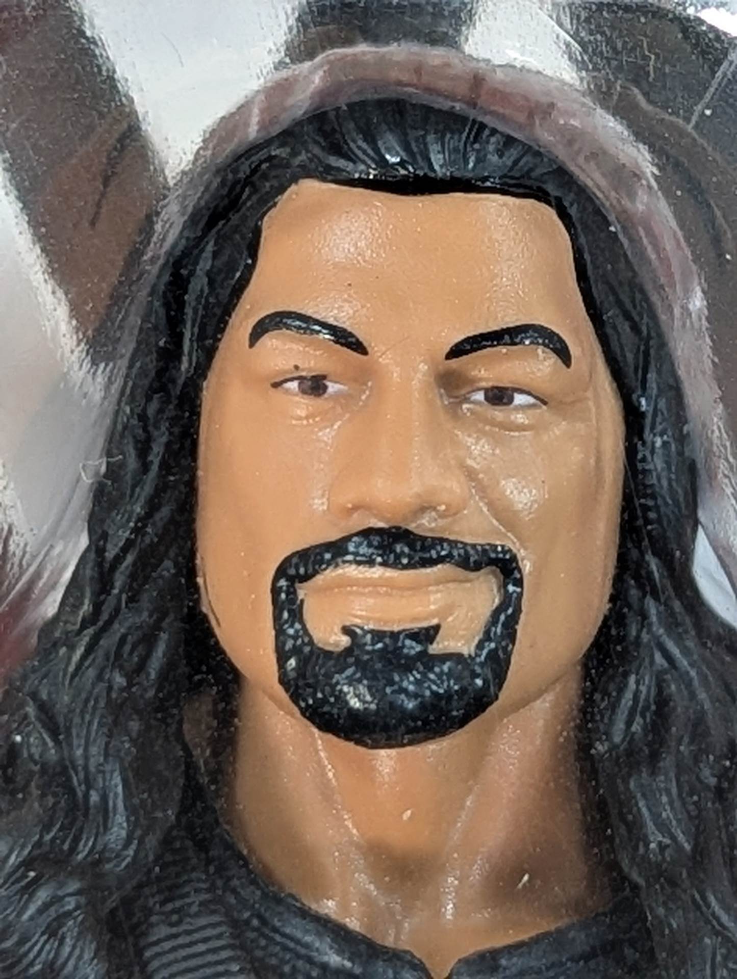 Roman Reigns  (black pants)