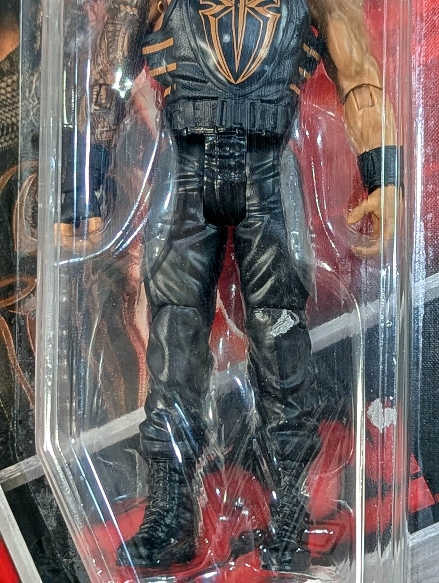 Roman Reigns  (black pants)