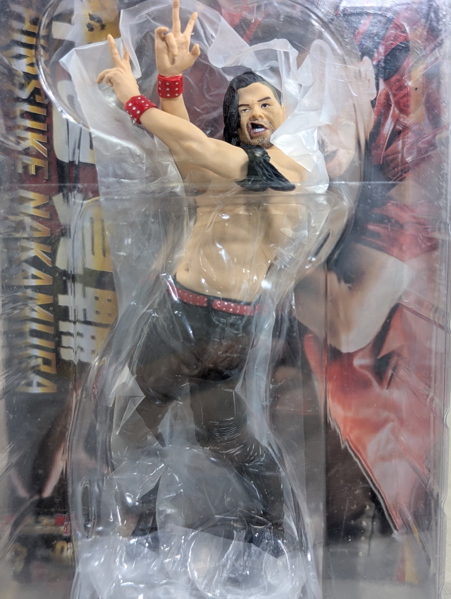 Shinsuke Nakamura  (black costume)
