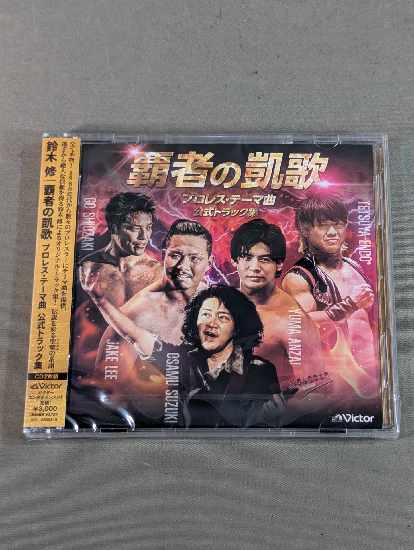 ★ Hand signed autograph with sticker ★ Pro Wrestling ・Theme Song Official Track Collection / Osamu Suzuki