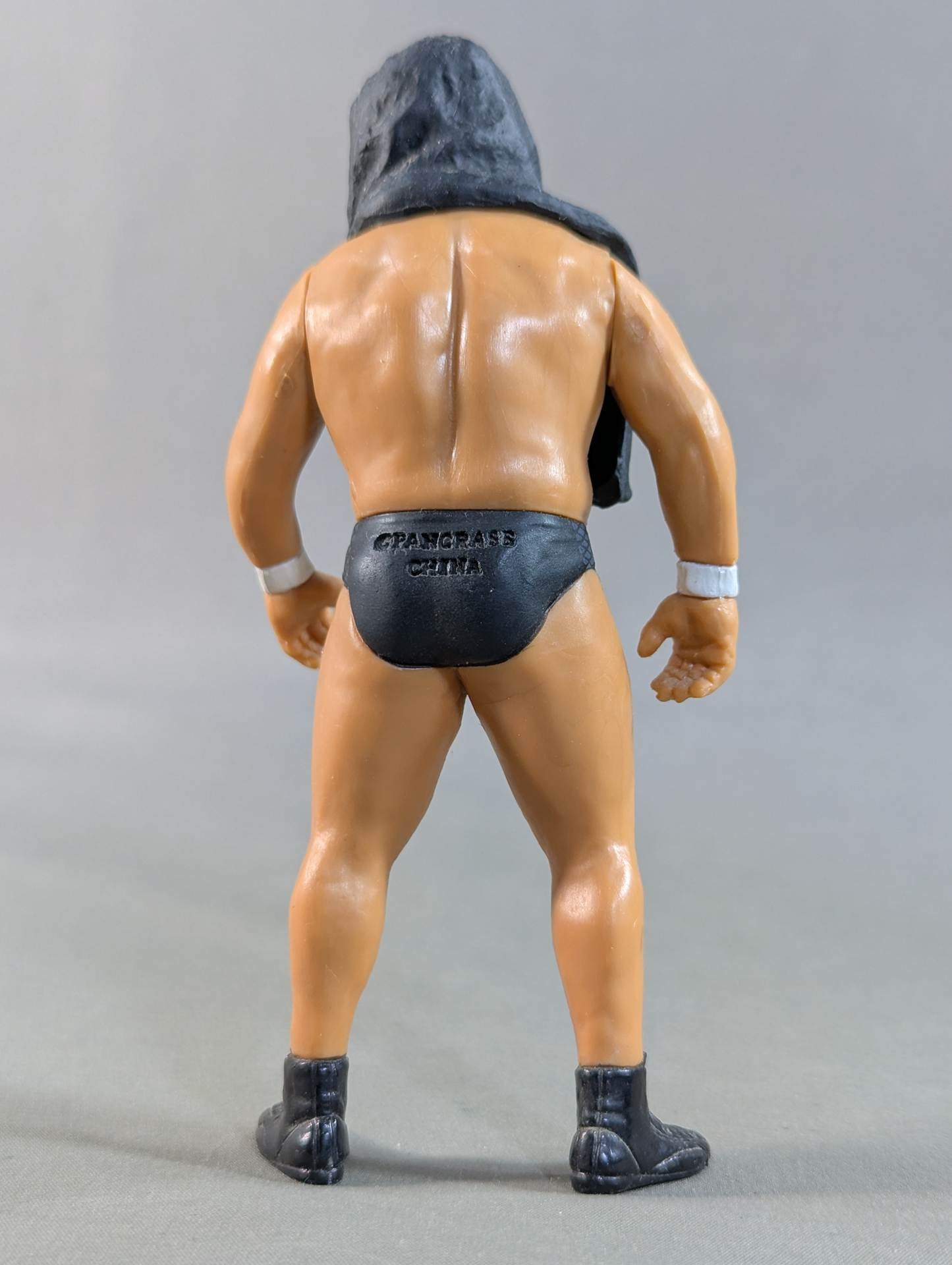 Minoru Suzuki (black shoes, black towel)