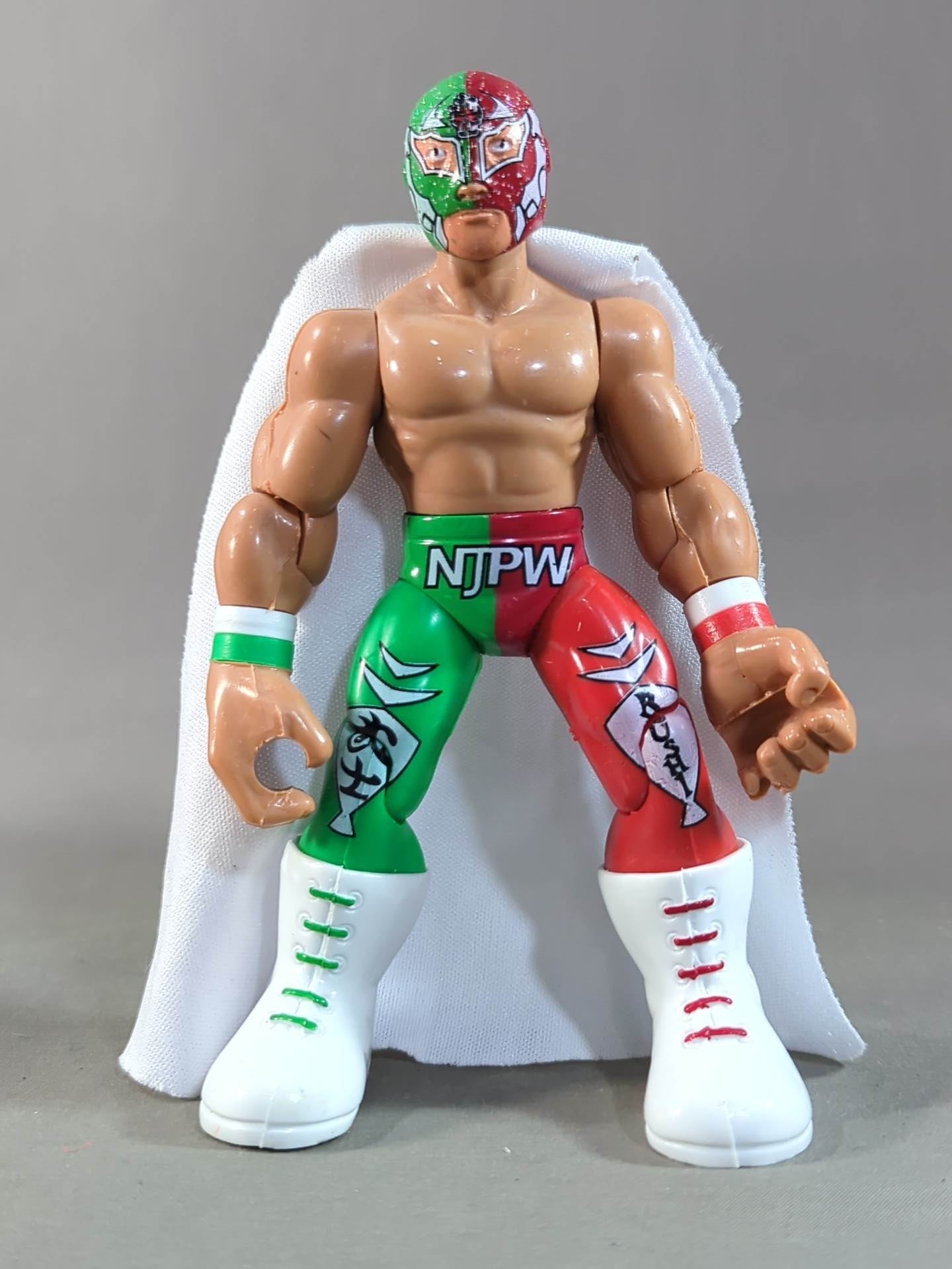 BUSHI  (Mexican figure, green× red)