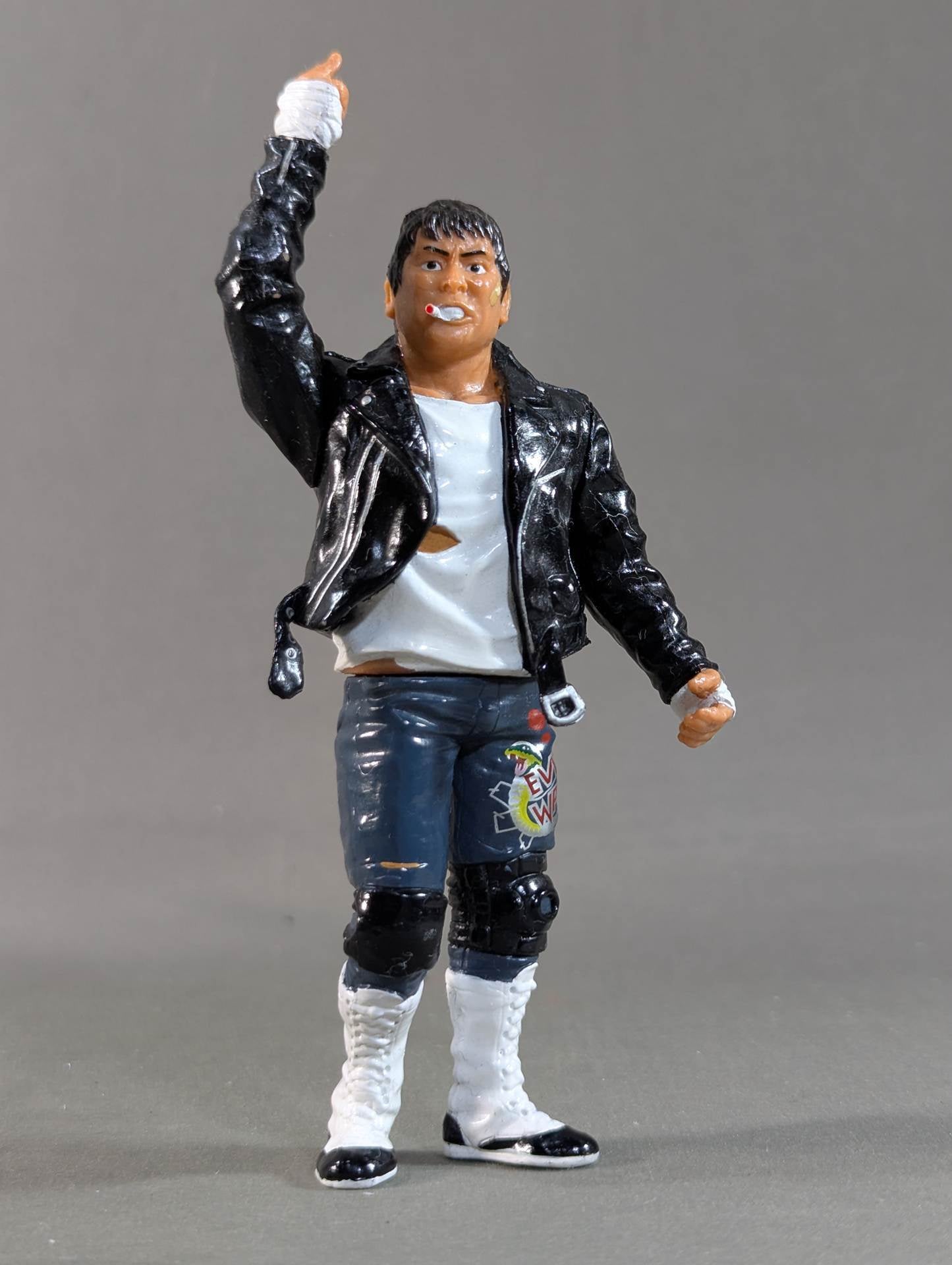 Atsushi Onita  (white shirt, leather jacket)