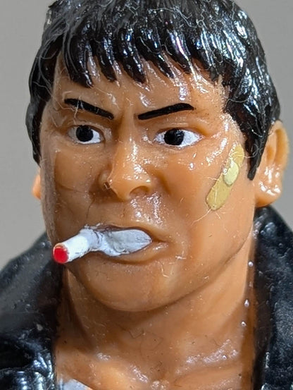 Atsushi Onita  (white shirt, leather jacket)