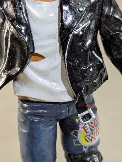 Atsushi Onita  (white shirt, leather jacket)