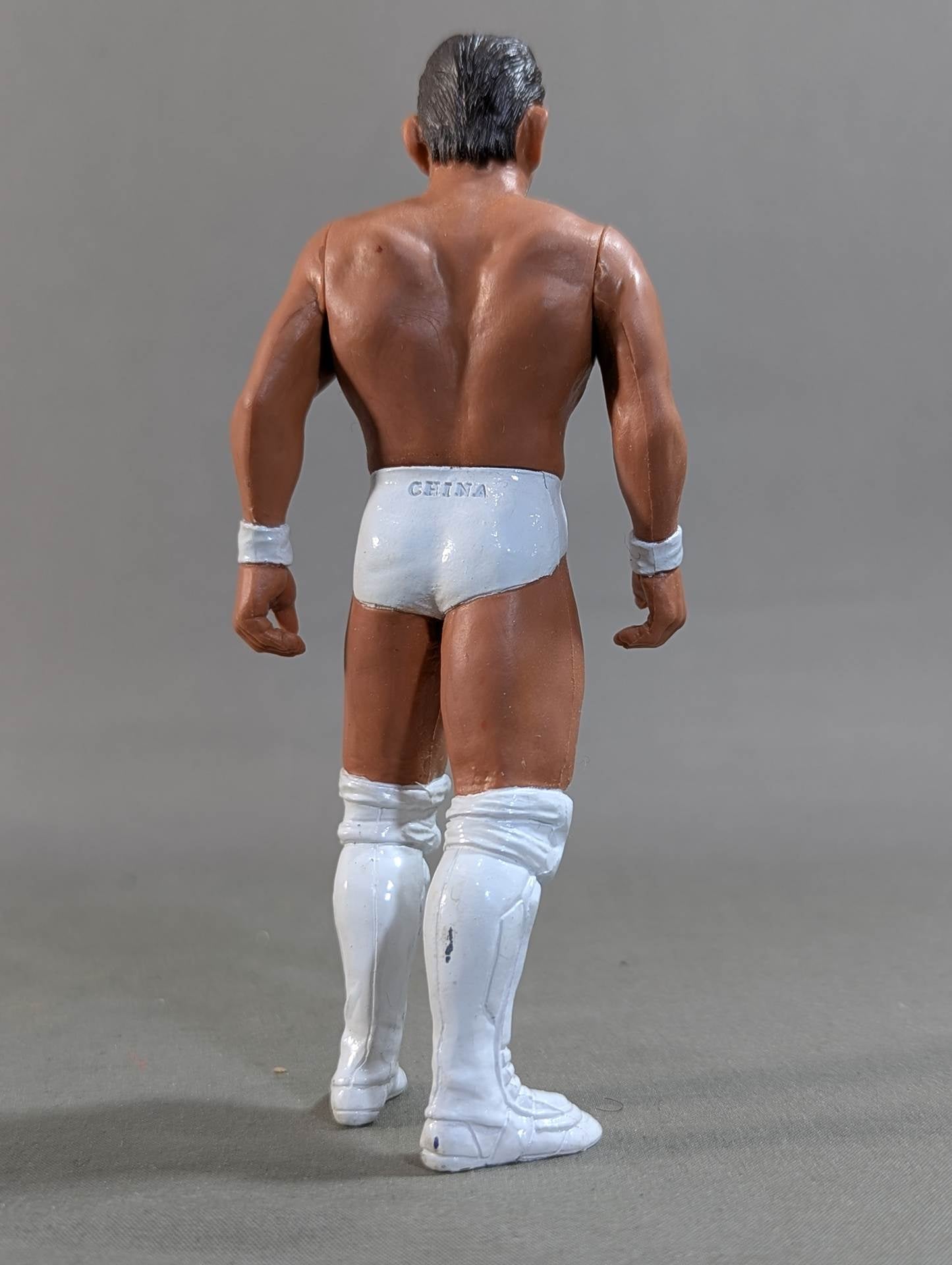 Minoru Suzuki (white shin pads )