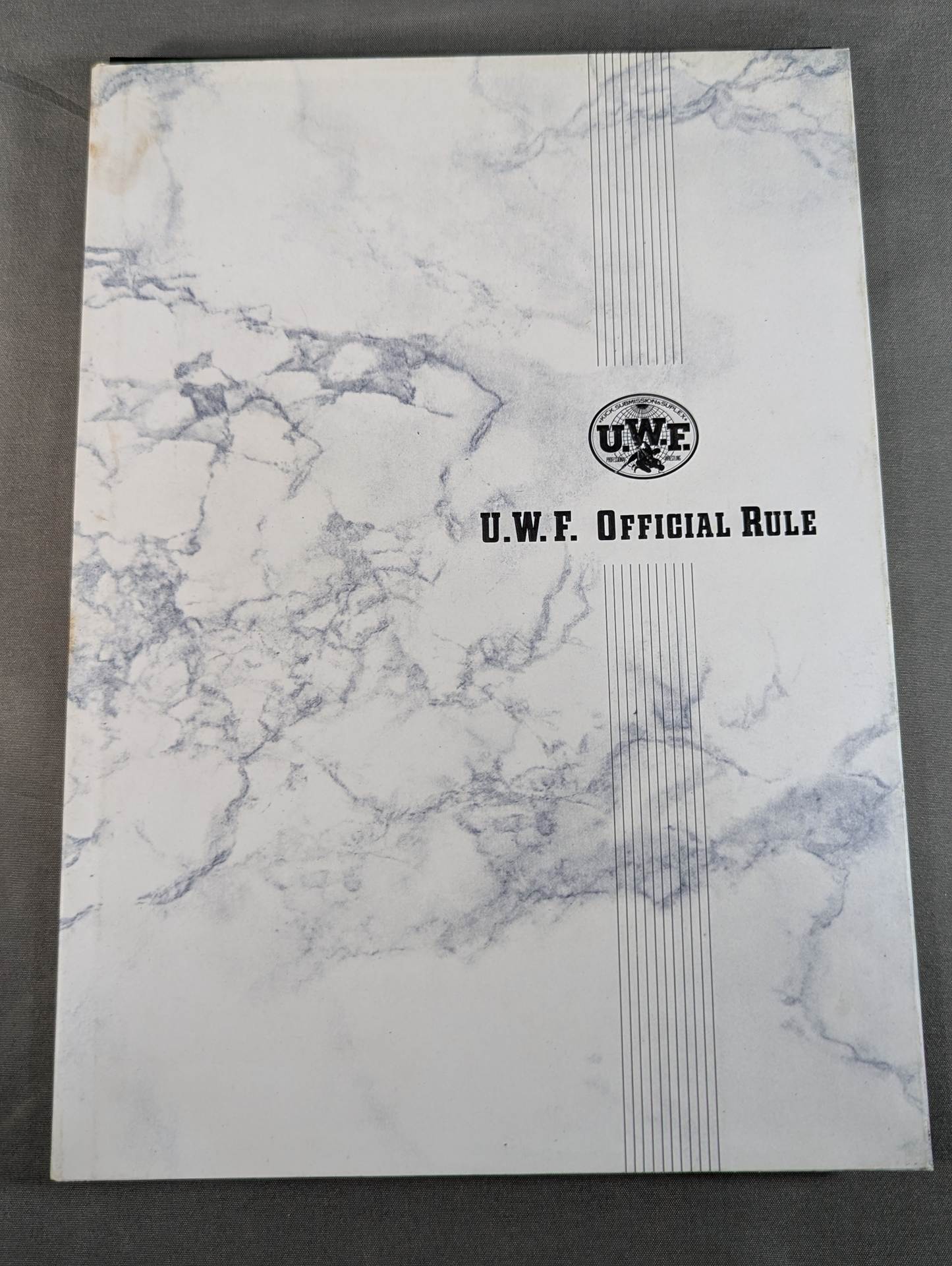U.W.F. OFFICIAL RULE 1989.5.4~
