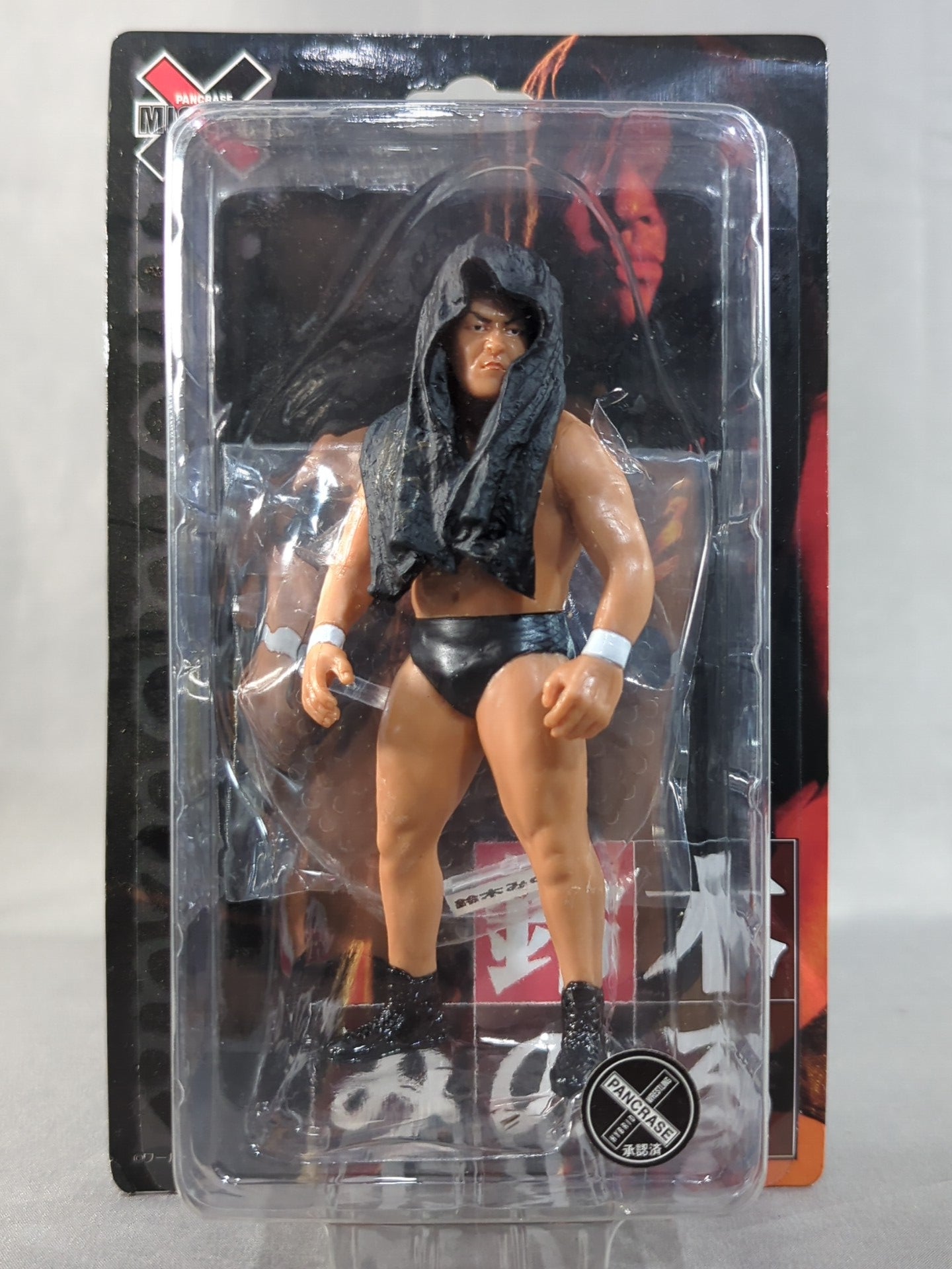 Minoru Suzuki (black shoes, black towel)