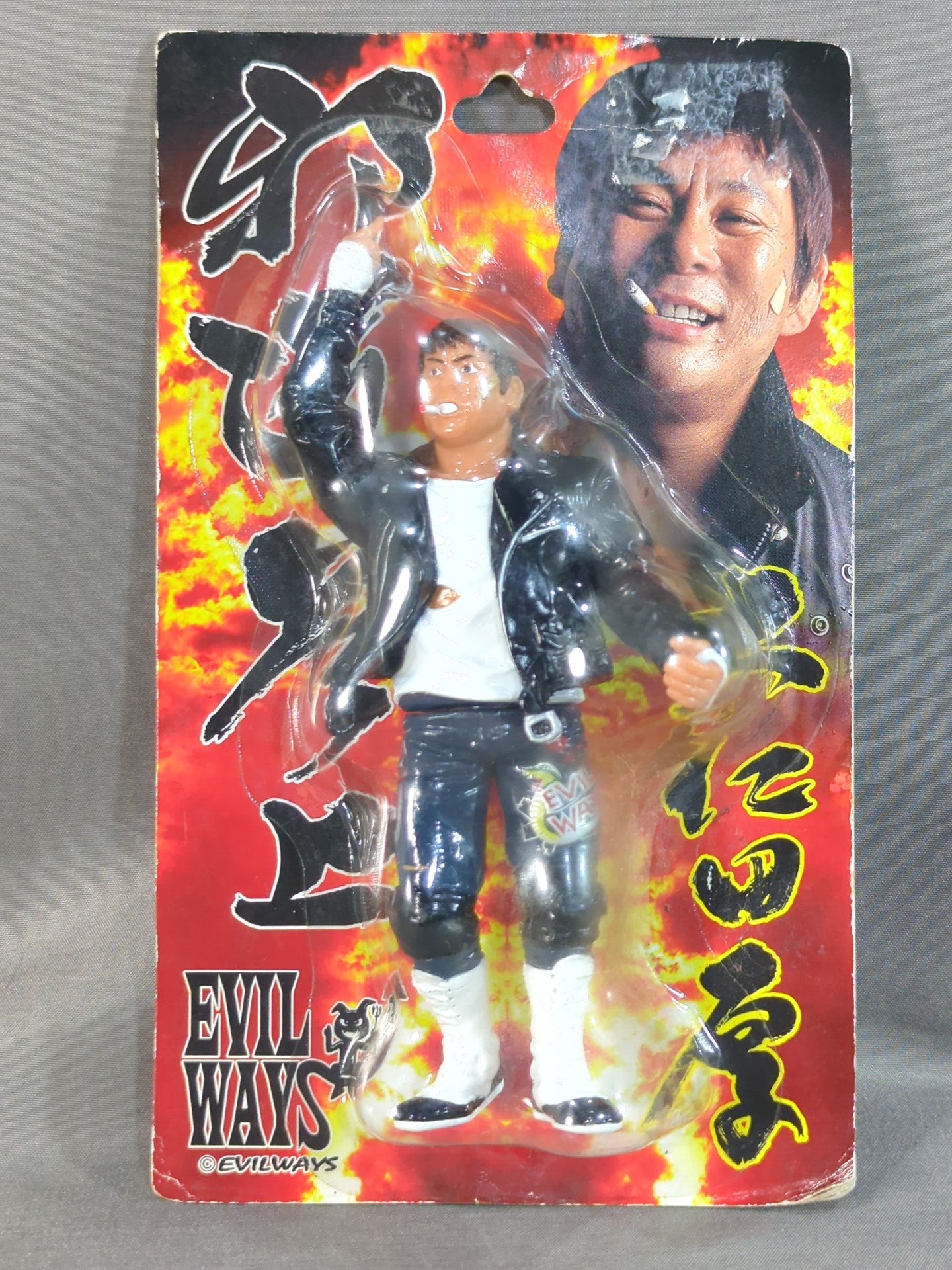 Atsushi Onita  (white shirt, leather jacket)