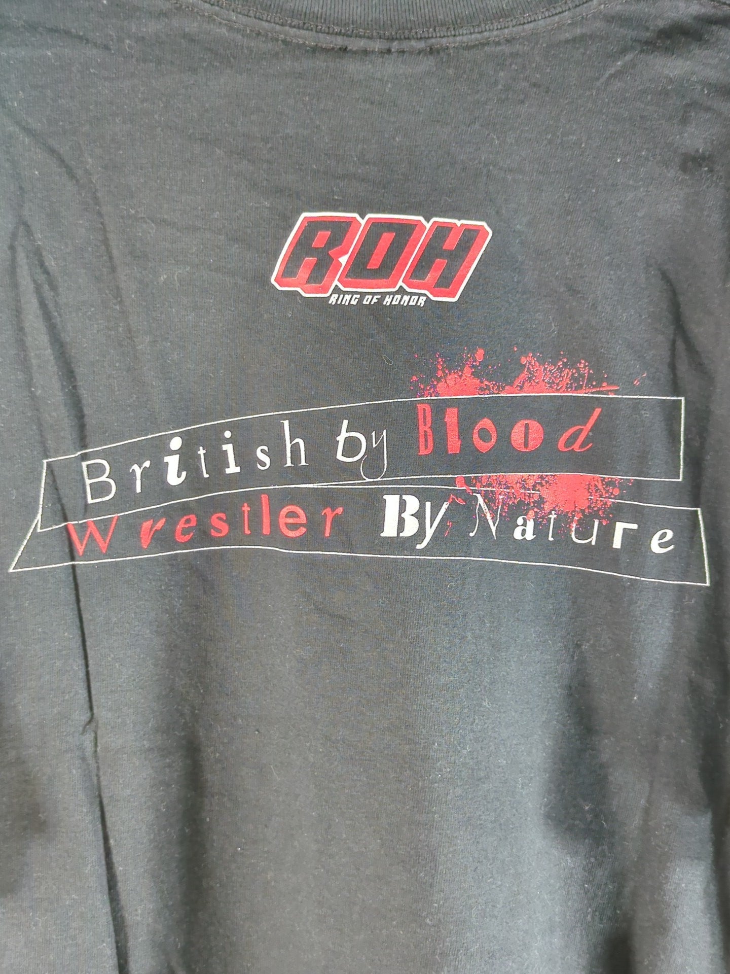 ROH ナイジェル・マッギネス「British by Blood Wrestler By Nature」Tシャツ(ブラック)