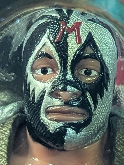 Mil Mascaras  (Black & Silver Half Trade, Green Shark Mouth, IWA Belt)
