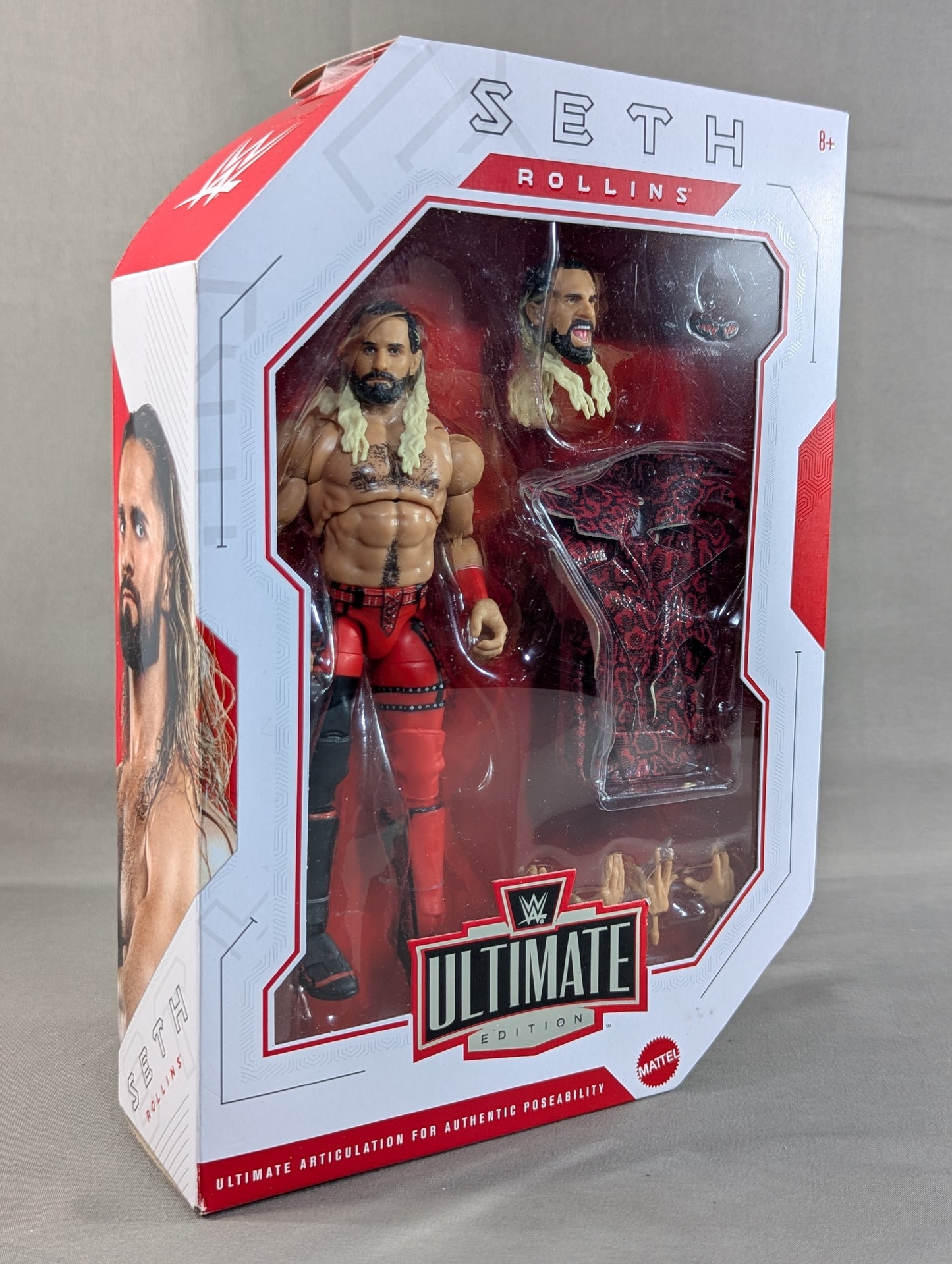 Seth Rollins (red x black tights & jacket)