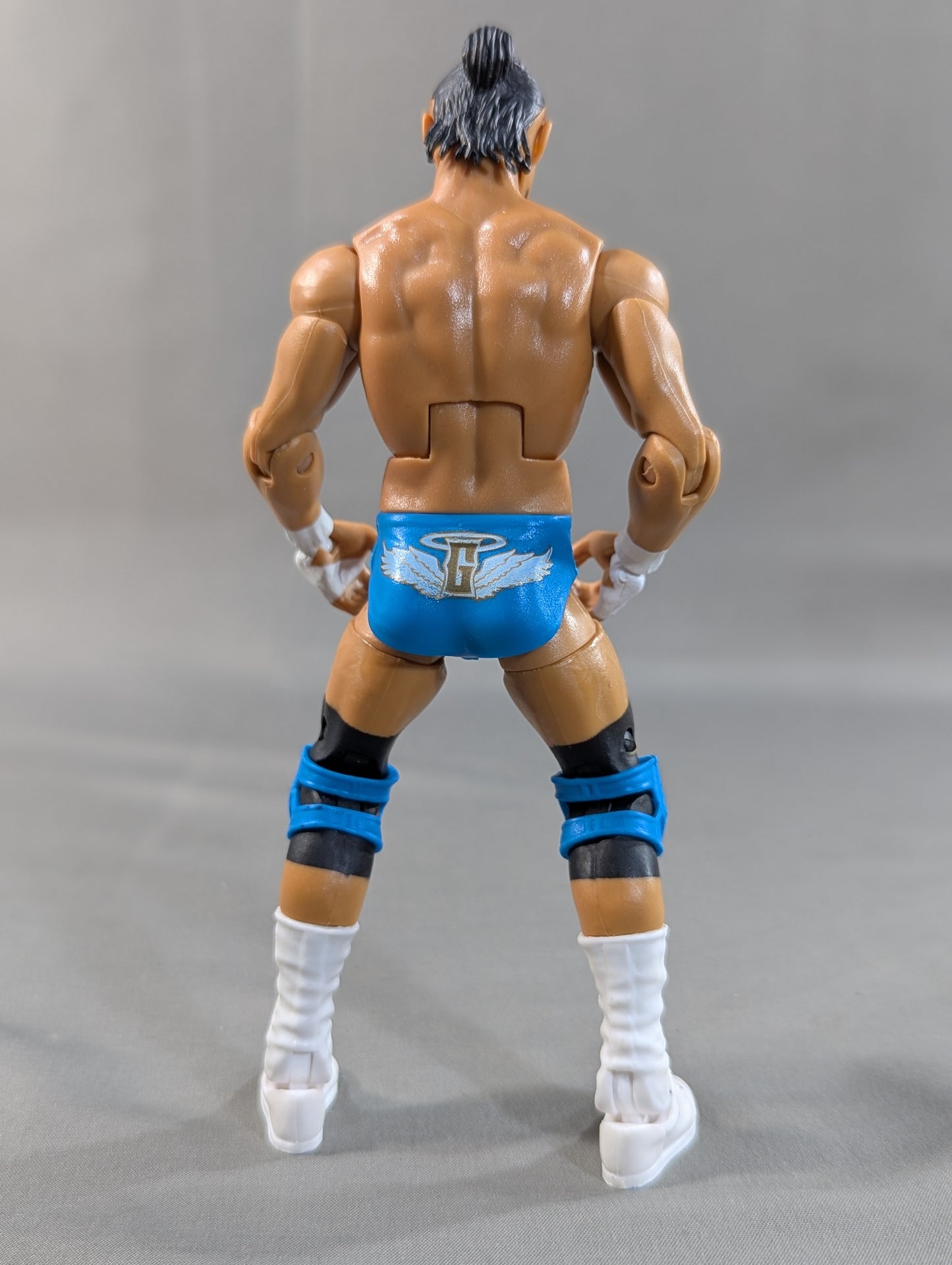 Angel Garza (light blue pants)