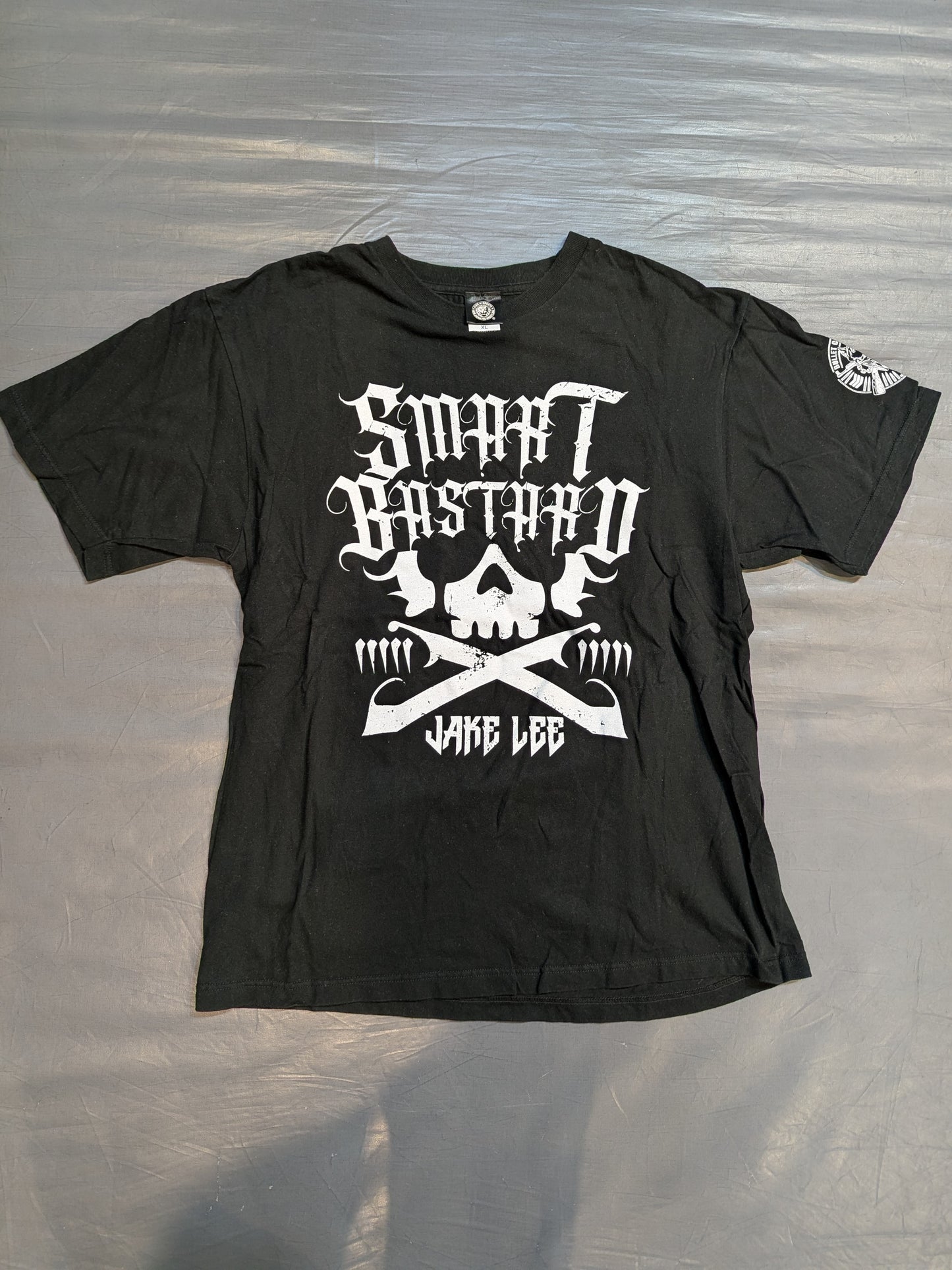 ジェイク・リー「SMART BASTARD」Tシャツ