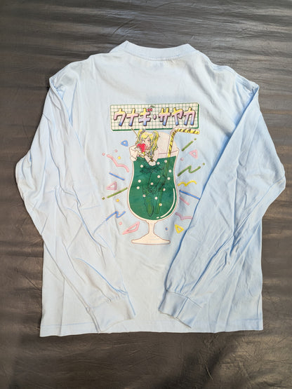 ウナギ・サヤカ「極彩メロンソーダブリーフ味」ロングスリーブTシャツ(ライトブルー)
