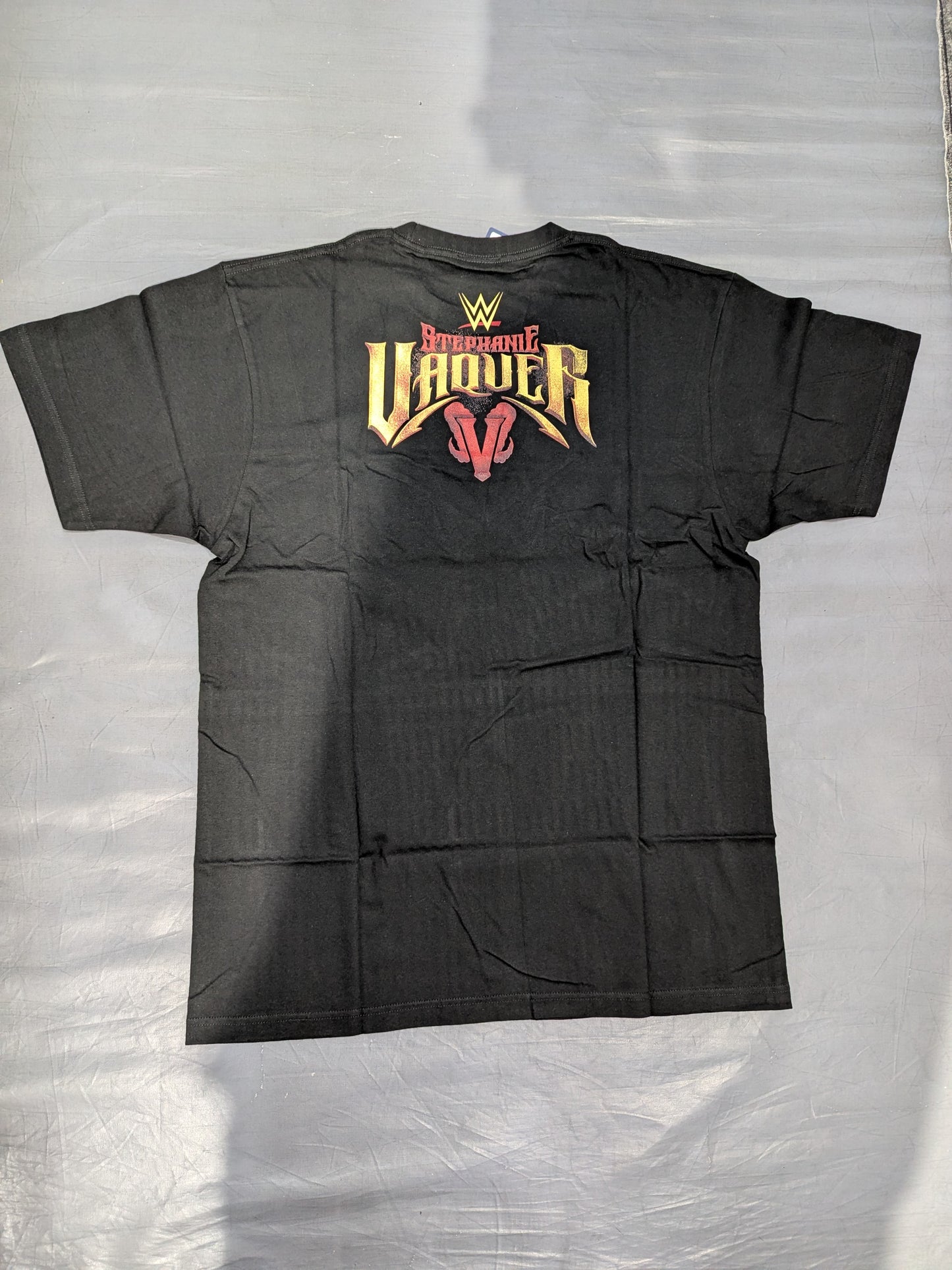 Stephanie Bakkel "LA PRIMERA" Picture T-Shirt (WWE (2020s) / Black)