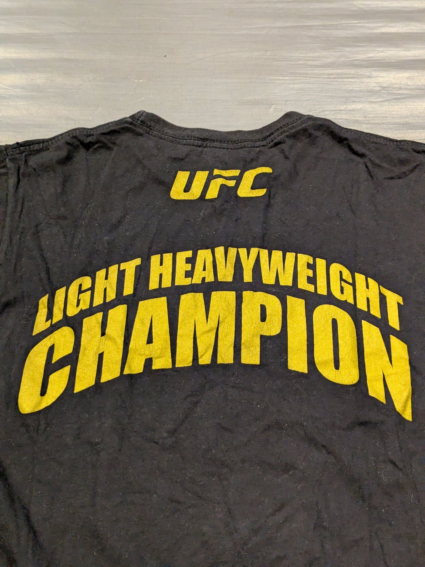 ジョン・ジョーンズ「LIGHT HEAVYWEIGHT CHAMPION」Tシャツ