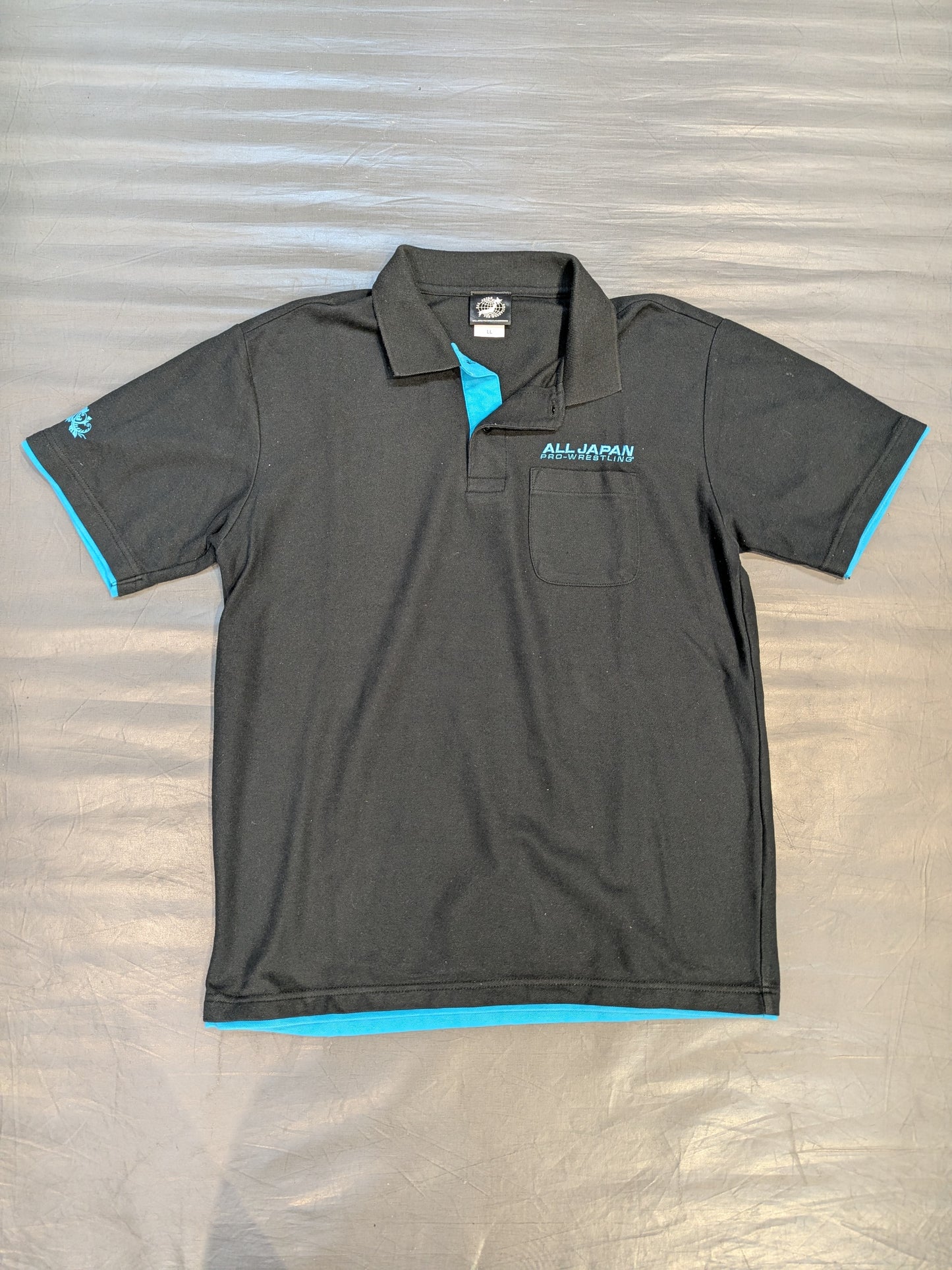All Japan Pro Wrestling  "40th ANNIVERSARY" Polo Shirt (Black× Light Blue)