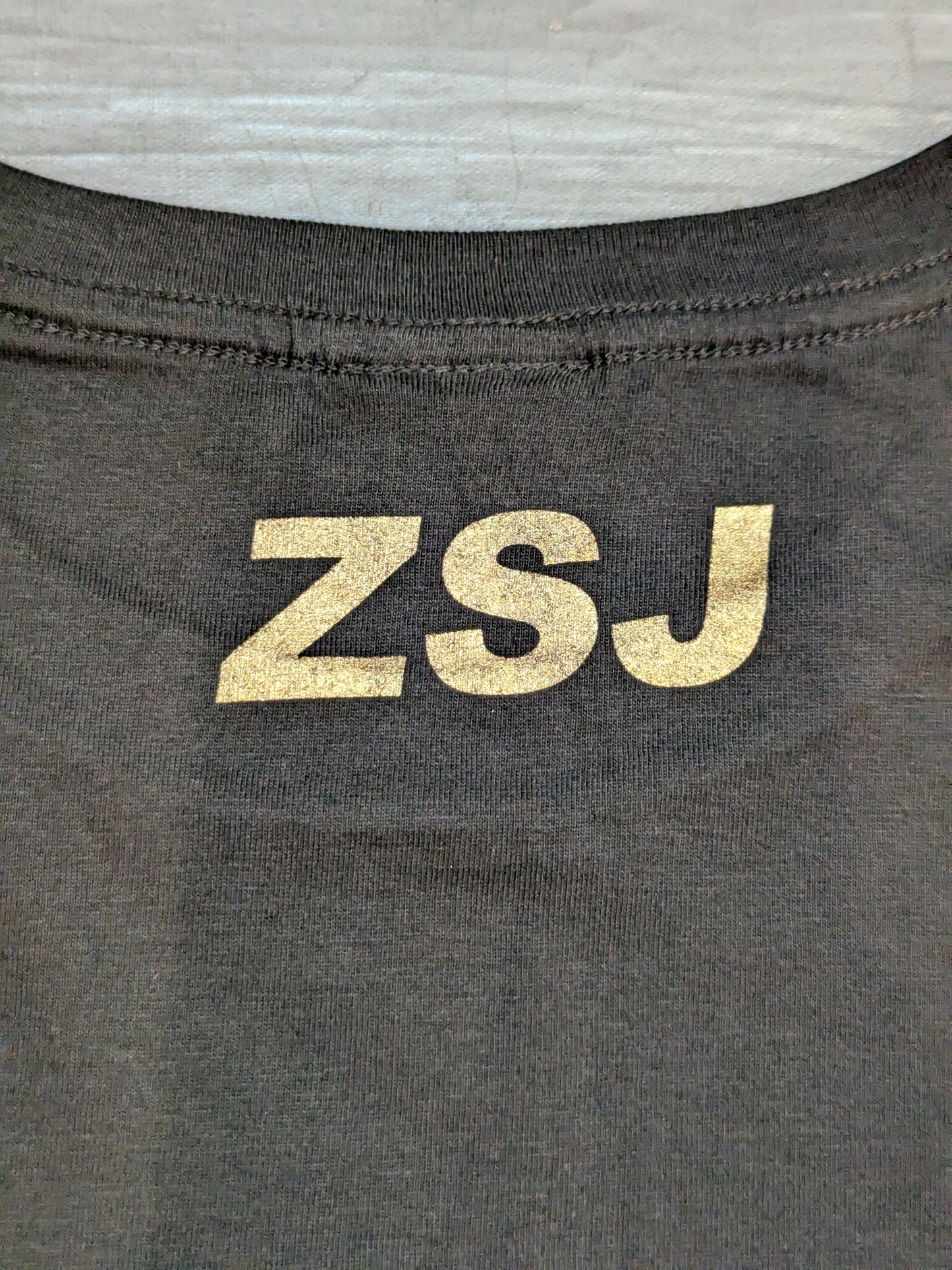 Zack Sabre Jr . TEKKERS. T-shirt (Gold)
