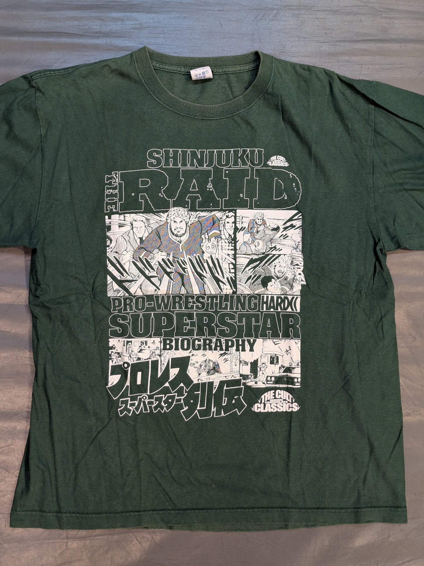 Pro Wrestling Superstar Chronicles 'Shinjuku Kick Incident' T-shirt (Kick Ivy Green)
