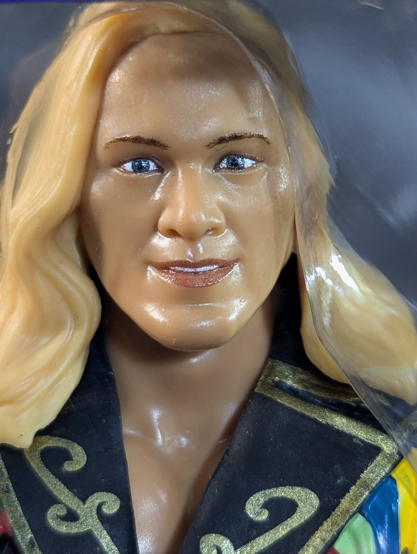 Chris Jericho (Black jacket, yellow pants)