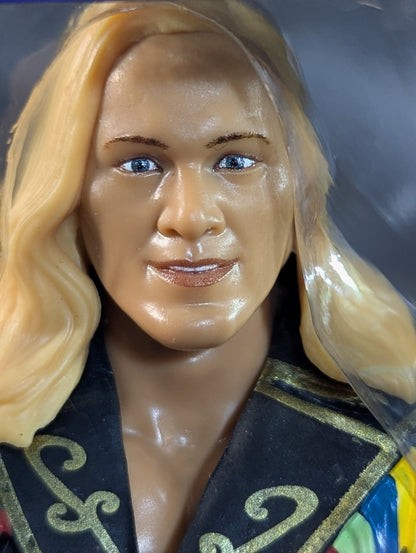 Chris Jericho (Black jacket, yellow pants)