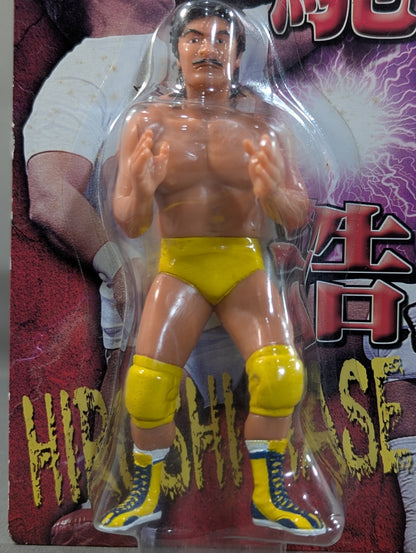 Hiroschi Hase  (yellow pants)
