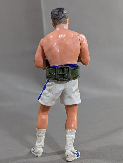Joichiro Tatsuyoshi (beardless, blue glove)