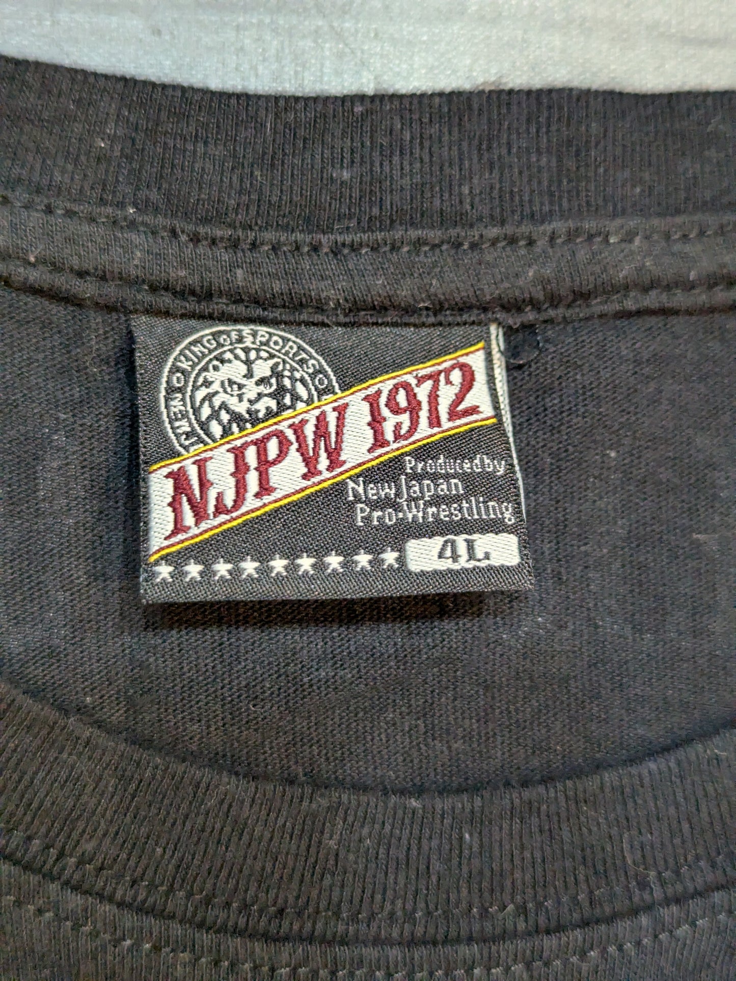 新日本プロレス×しまむら ライオンマーク Tシャツ①(ブラック×青迷彩)