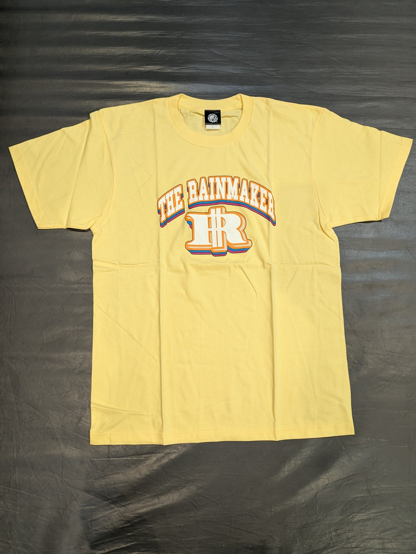 オカダ・カズチカ「THE RAINMAKER」Tシャツ(ライトイエロー)
