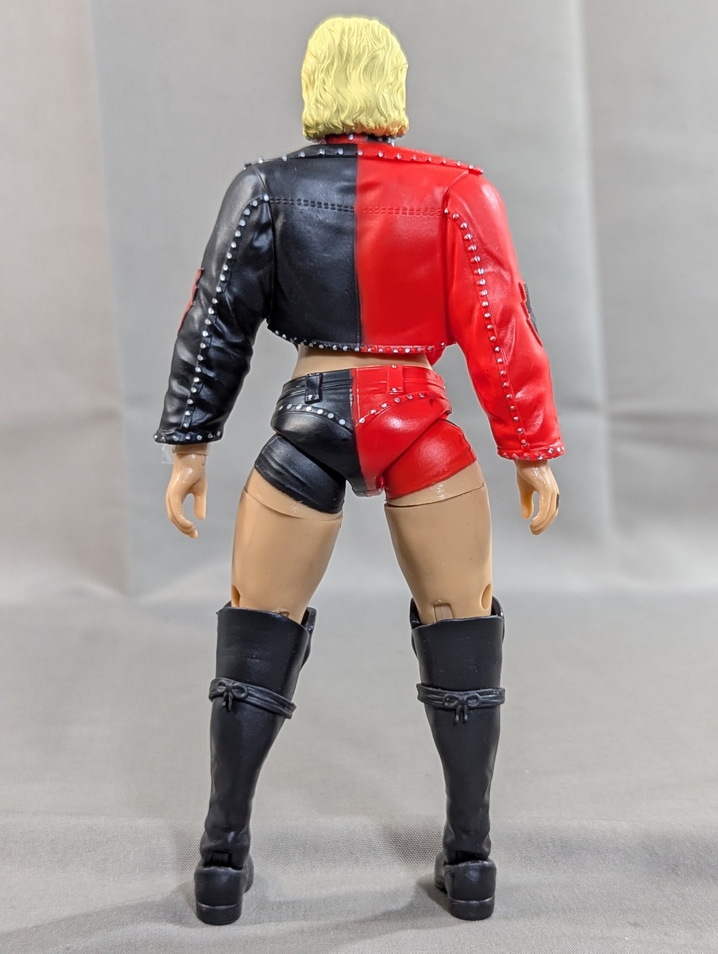 Toni Storm  (Red × Black Costume)