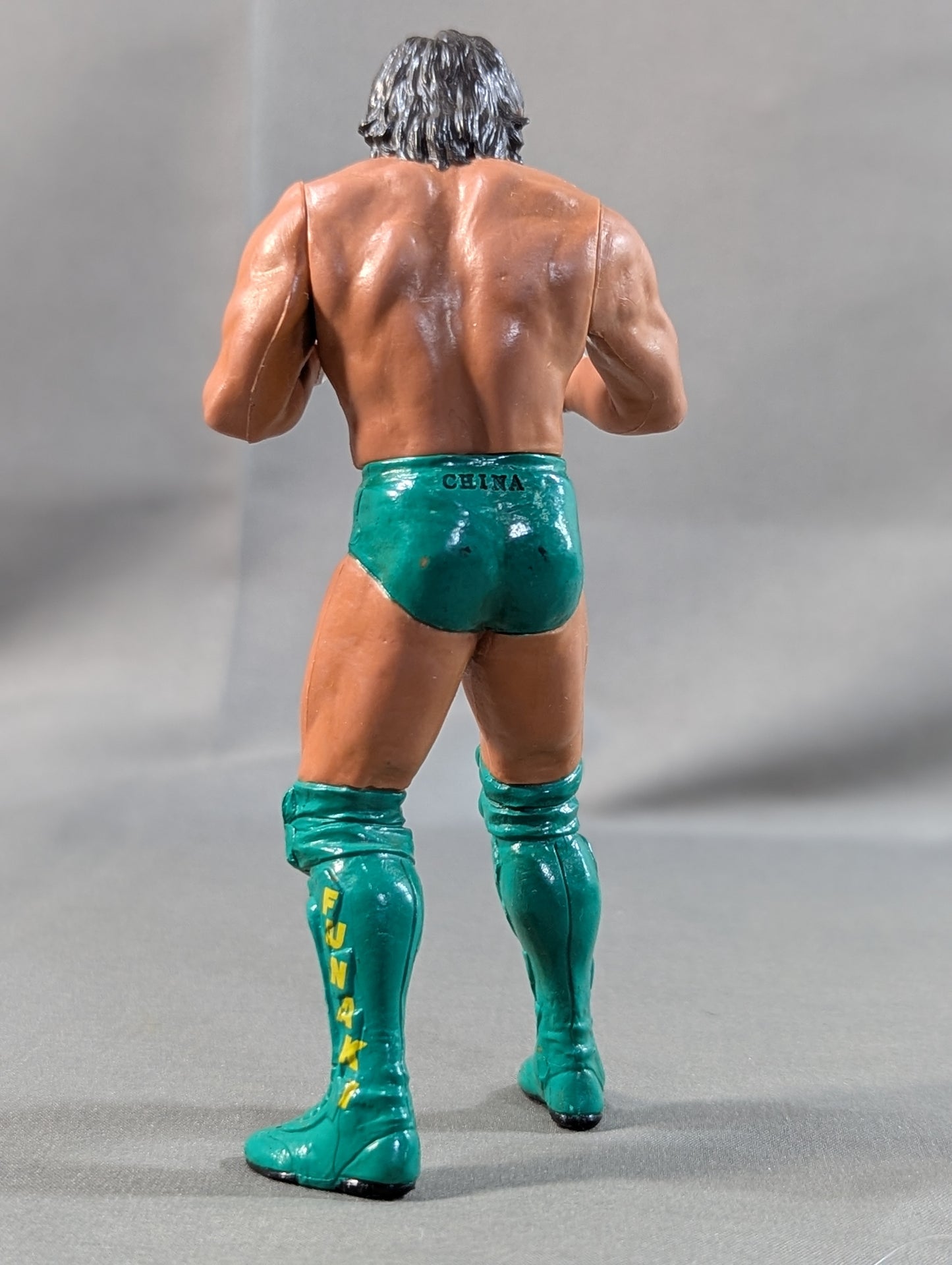 Masakatsu Funaki  (green pants)