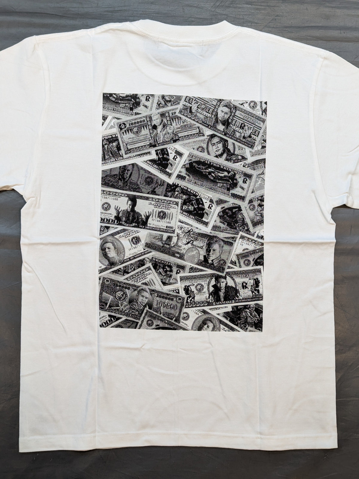 オカダ・カズチカ「RAINMAKER DOLLAR HISTORY」Tシャツ(ホワイト)