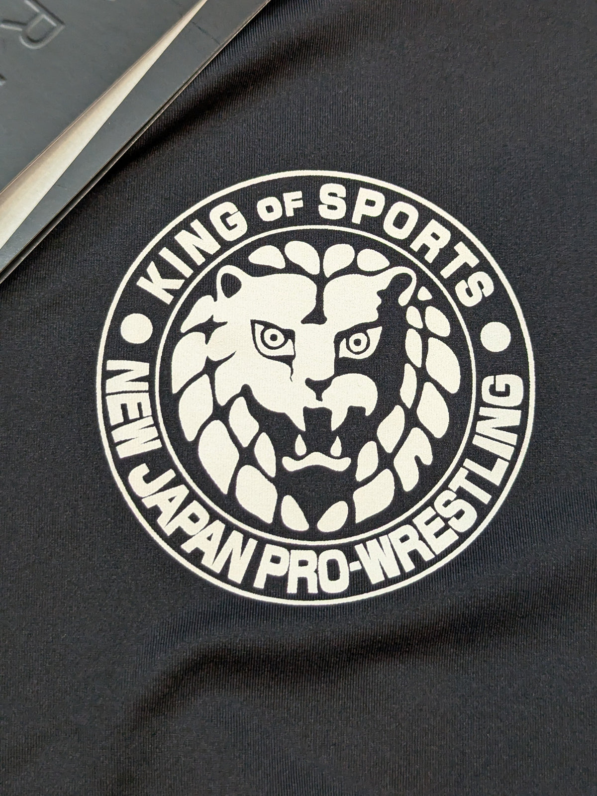 BLK/BLK UA Rush Lion Mark Armor Short Sleeve