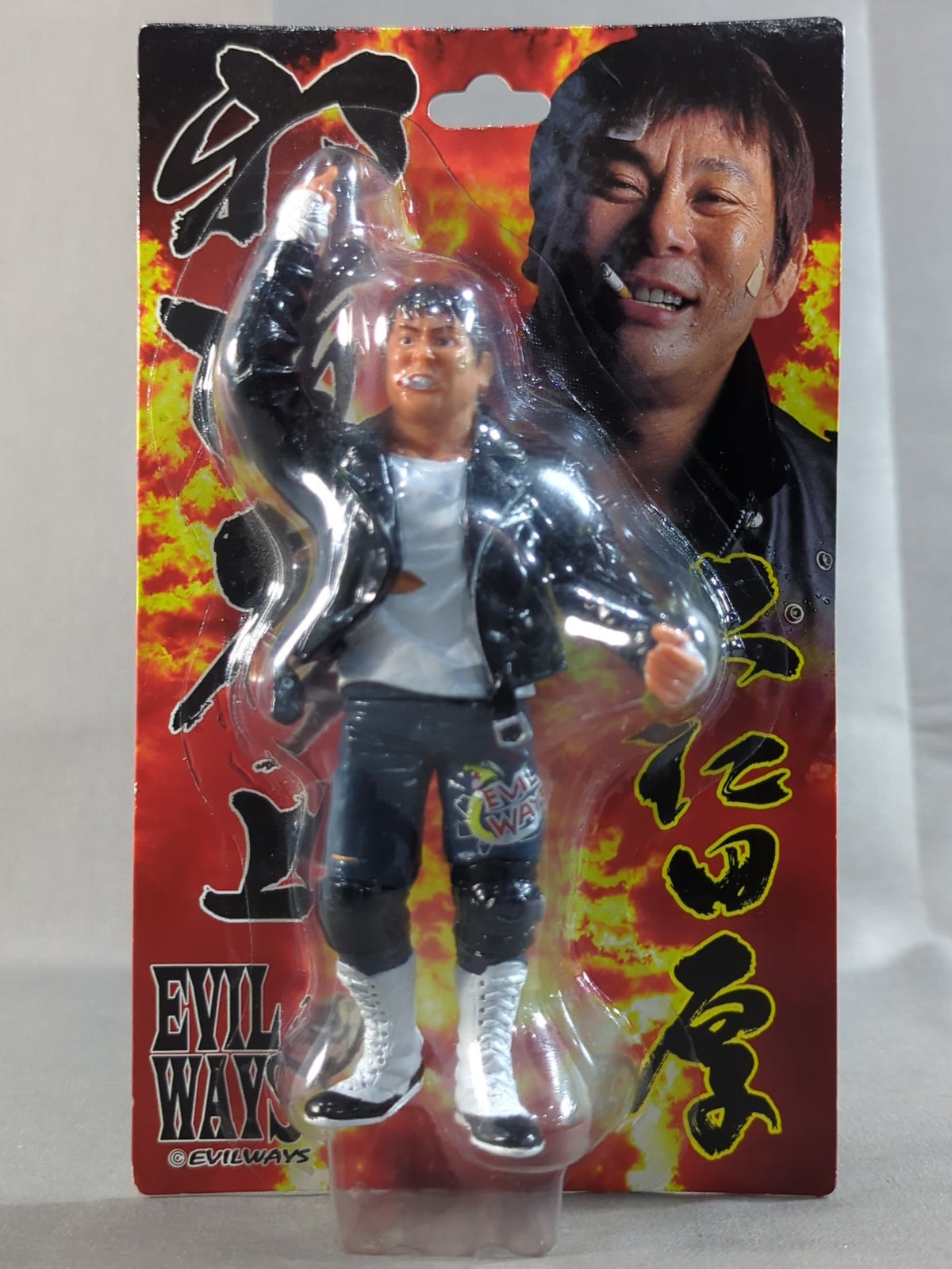 Atsushi Onita  (white shirt, leather jacket)