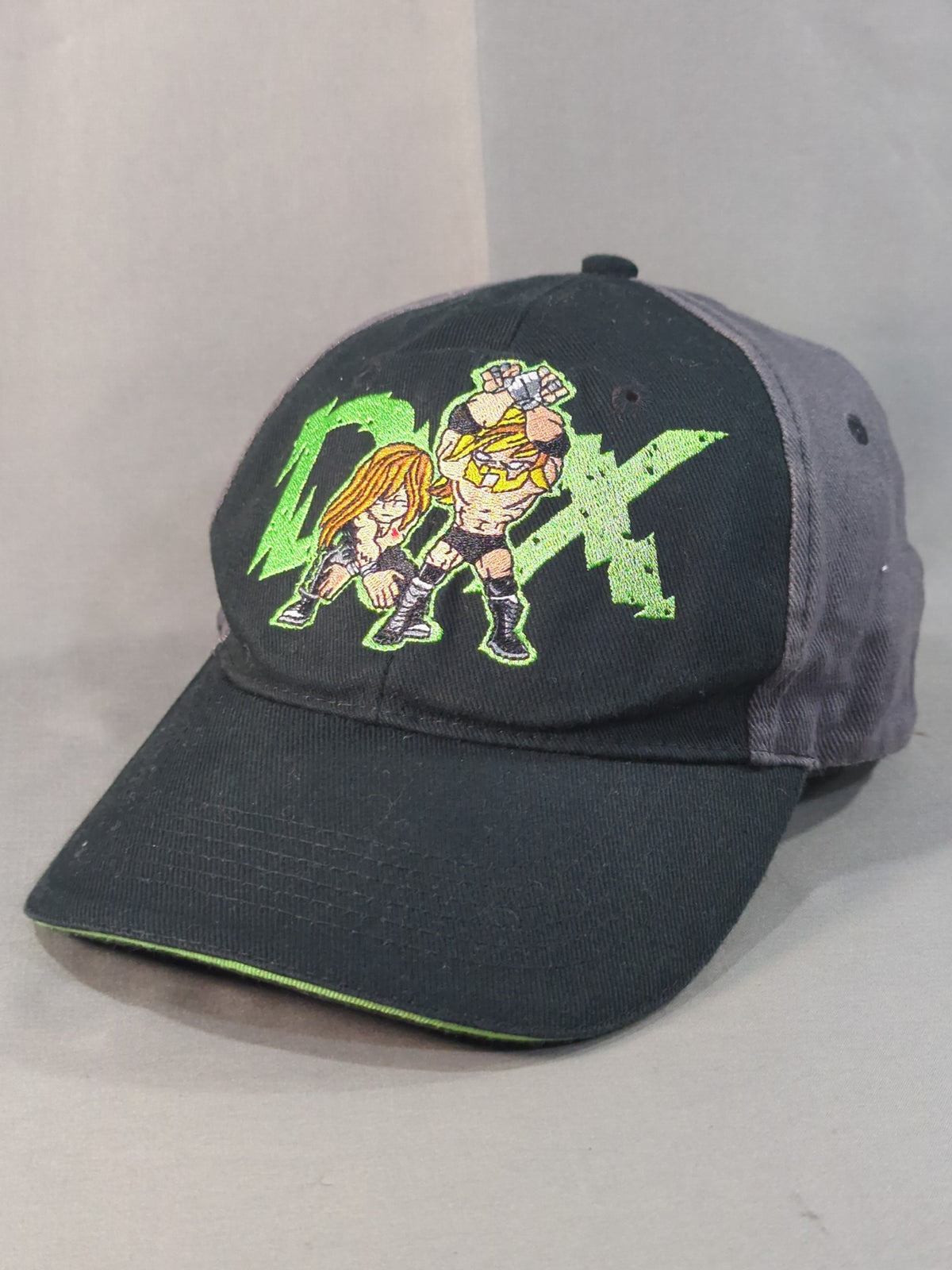 D-GENERATION X Illustration Cap (1) (WWE/Black × Gray)