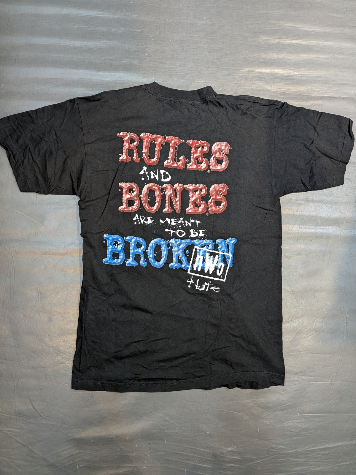 nWo「RULS AND BONESARE MEANT TO BE BROKEN」Tシャツ(WCW(1990s) / ブラック)