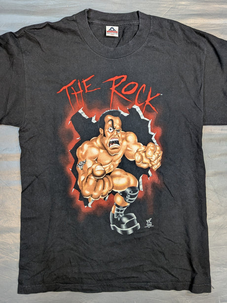 ザ・ロック「SMELL WHAT THE ROCK IS COOKING.」ピクチャーTシャツ(WWF(1998) / ブラック)