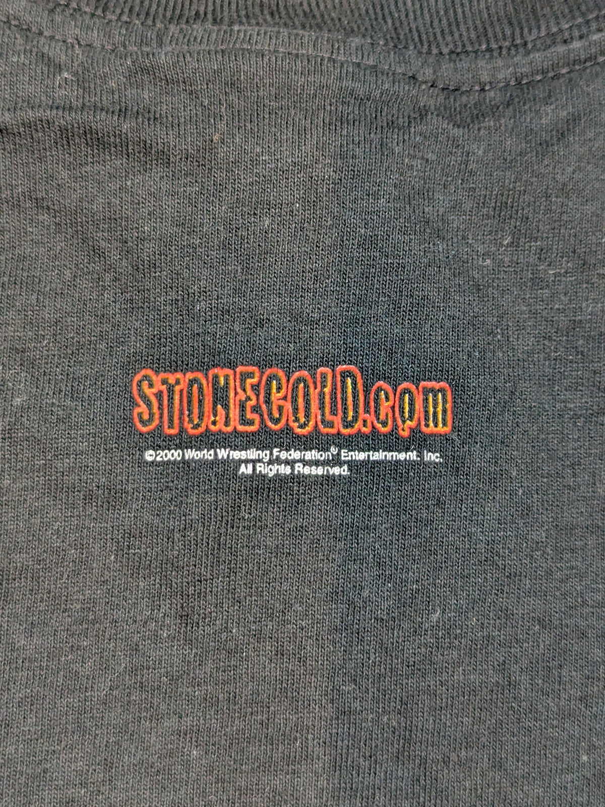 ストーン・コールド・スティーブ・オースチン「WHAT A HELL YOU LOOKING AT JACK ASS!!」Tシャツ(WWF(2000) / ブラック)