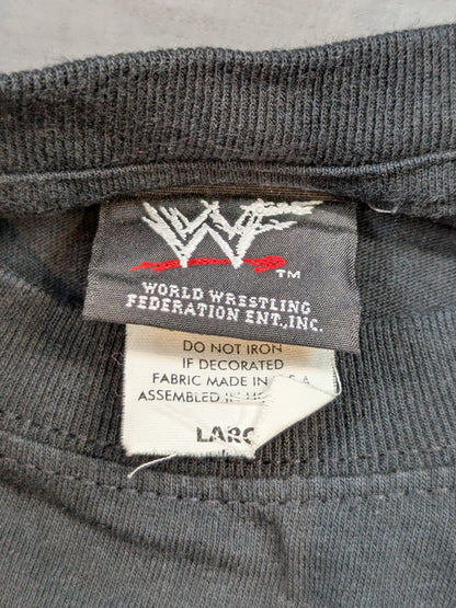 ストーン・コールド・スティーブ・オースチン「WHAT A HELL YOU LOOKING AT JACK ASS!!」Tシャツ(WWF(2000) / ブラック)